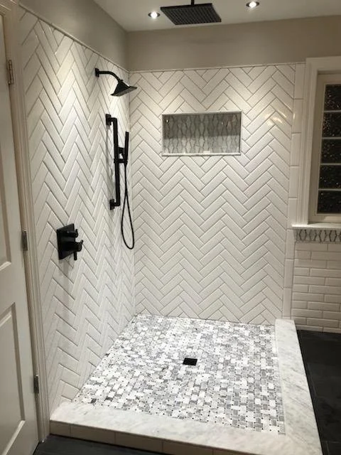 Bathroom renovation, Cary NC. Walk-in shower conversion, new tile, vanity, and fixtures.