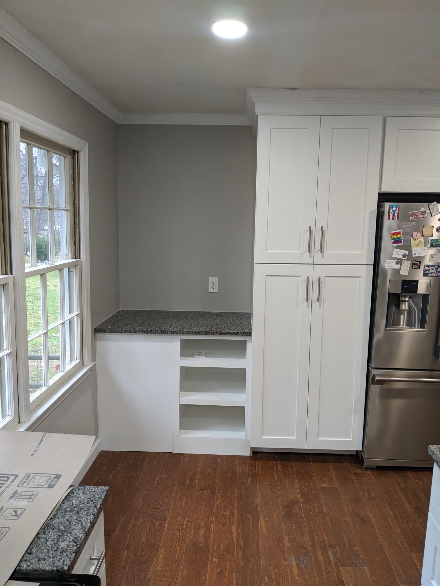 Kitchen cabinet installation, Triangle area. Finished cabinets and hardware.