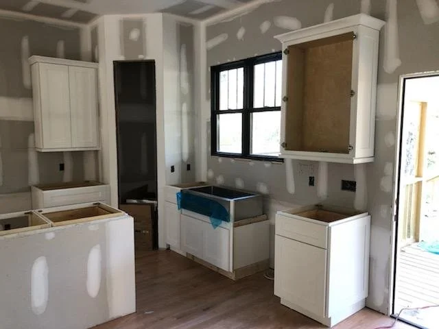 Kitchen remodel, Apex NC. KCD, backsplash, and flooring.