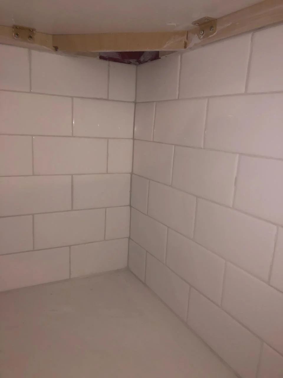 Kitchen backsplash, Morrisville NC. Subway tile, clean grout, no visible cuts at sight lines.
