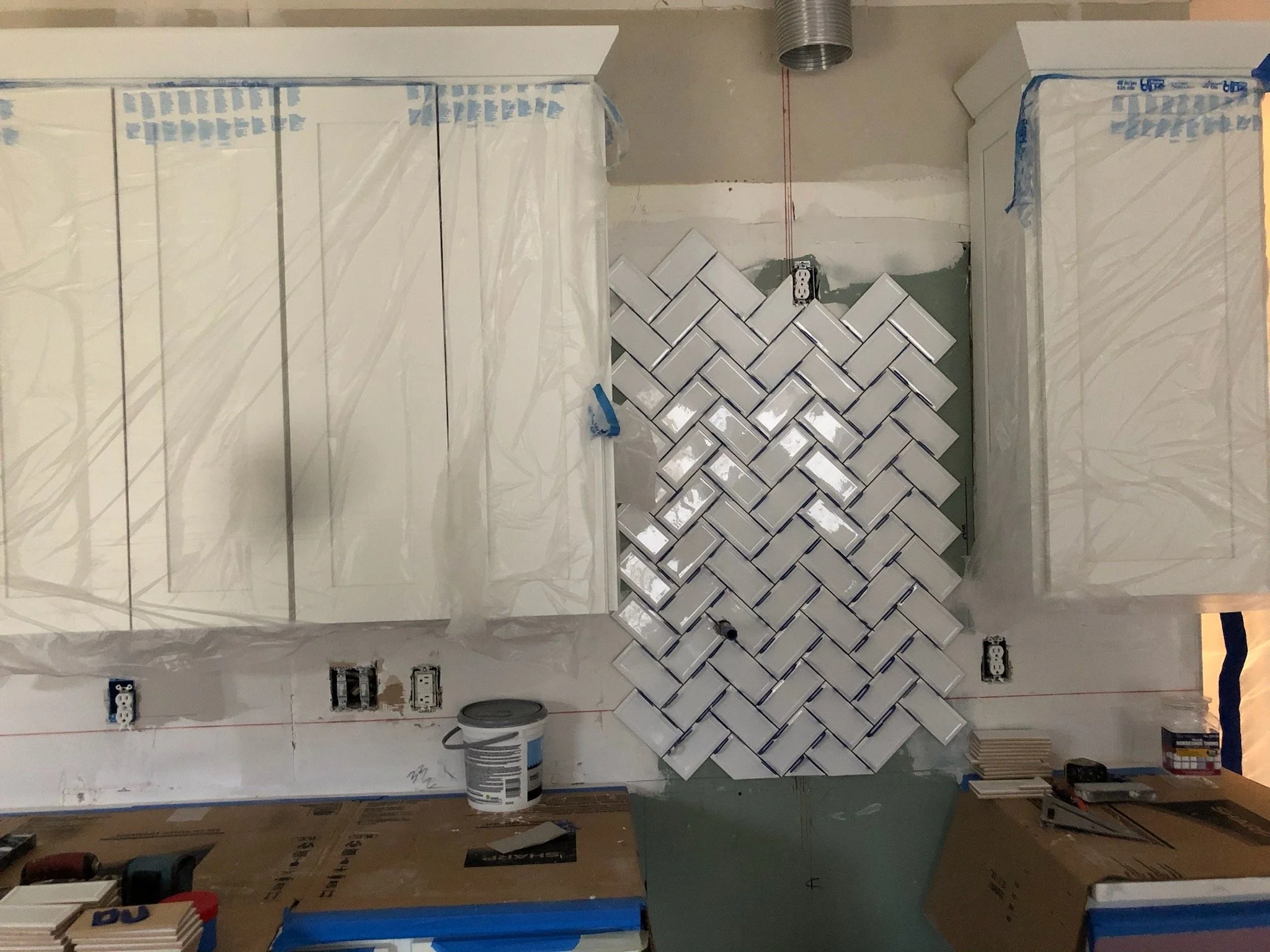 Shower wall tile, Cary NC. Custom layout planned from the door line.